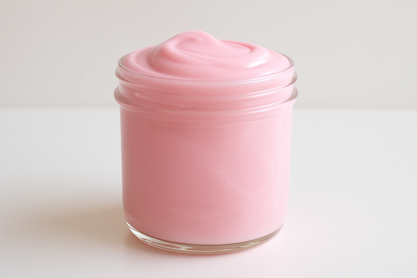 light pink plain slime in a slightly tall container