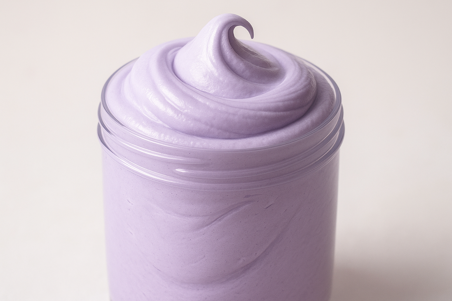 light purple buttery slime in a slightly tall container